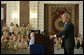 President George W. Bush speaks to U.S. troops and U.S. embassy personnel during an unannounced 5-hour trip to Baghdad, Iraq, Tuesday, June 13, 2006. "These are historic times," said the President. "The mission that you're accomplishing here in Iraq will go down in the history books as an incredibly important moment in the history of freedom and peace; an incredibly important moment of doing our duty to secure our homeland." White House photo by Eric Draper