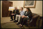 President George W. Bush meets with miner Randal McCloy Jr., and his wife Anna in the Eisenhower Executive Office Building Thursday, June 15, 2006, before signing S. 2803, the Mine Improvement and New Emergency Response Act. Mr. McCloy survived a January 2006 mining accident that left 12 others dead in Sago, West Virginia. White House photo by Eric Draper