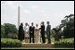 President George W. Bush stands with former Idaho Gov. Dirk Kempthorne as he is sworn-in as the new U.S. Secretary of Interior by Supreme Court Justice Antonin Scalia, left, Wednesday, June 7, 2006 on the South Lawn of the White House in Washington. Patricia Kempthorne holds the Bible during her husband’s swearing-in, joined by their children Heather Myklegard and son, Jeff Kempthorne. White House photo by Kimberlee Hewitt