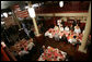 President George W. Bush, Laura Bush, and Japanese Prime Minister Junichiro Koizumi sit down for a bar-b-que lunch at Rendezvous restaurant, Friday, June 30, 2006, in Memphis, Tennessee, after taking a tour of Graceland and visiting the National Civil Rights Museum. White House photo by Shealah Craighead