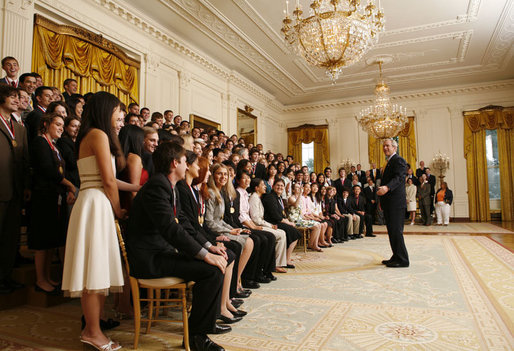 President George W. Bush takes a question from one of the 2006 Presidential Scholars in the East Room Monday, June 26, 2006. The program was established in 1964, and recognizes up to 141 distinguished graduating high school seniors. White House photo by Paul Morse