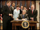 President George W. Bush signs into law S.2590, the Federal Funding Accountability and Transparency Act of 2006, Tuesday, Sept. 26, 2006, in the Dwight D. Eisenhower Executive Office Building. Looking on are Sen. Susan Collins, R-Maine, Chairwoman of the Homeland Security and Governmental Affairs Committee, and from left: Rep. Roy Blunt of Missouri, Sen. Barack Obama, D-Ill., Sen. Tom Carper, D-Del., Rep. Jeb Hensarling of Texas, and Rep. Henry Waxman of California. White House photo by Kimberlee Hewitt