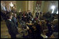 President George W. Bush stands with Senators Bill Frist, pictured in the foreground, and Mitch McConnell as he addresses the press after meeting with the Republican Senate Conference at the U. S. Capitol Thursday, Sept. 28, 2006. White House photo by Eric Draper