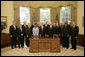 President George W. Bush meets with recipients of the Secretary of Defense Employer Support Freedom Award, Friday, Sept. 22, 2006 in the Oval Office. Presented annually, the award recognizes employers who provide outstanding support for their National Guard and Reserve employees. White House photo by Eric Draper