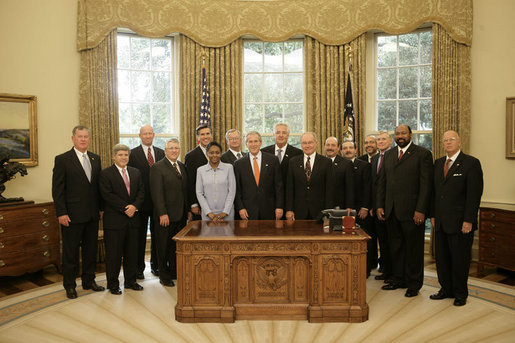 President George W. Bush meets with recipients of the Secretary of Defense Employer Support Freedom Award, Friday, Sept. 22, 2006 in the Oval Office. Presented annually, the award recognizes employers who provide outstanding support for their National Guard and Reserve employees. White House photo by Eric Draper