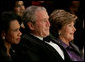 President George W. Bush and Laura Bush attend the 2006 National Book Festival Gala, an annual event of books and literature, Friday evening, Sept. 29, 2006 at the Library of Congress in Washington, D.C., joined by U.S. Secretary of State Condoleezza Rice, left. White House photo by Paul Morse