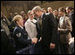 President George W. Bush greets audience members after addressing the Reserve Officers Association Friday, Sept. 29, 2006. White House photo by Eric Draper