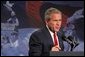 During a tour of equpiment from Libya's former nuclear weapons program, President George W. Bush delivers remarks on the War on Terror at the Oak Ridge National Laboratory in Oak Ridge, Tenn., Monday, July 12, 2004. "These materials are the sobering evidence of a great danger. Certain regimes, often with ties to terrorist groups, seek the ultimate weapons as a shortcut to influence," said the President. "These materials, voluntarily turned over by the Libyan government, are also encouraging evidence that nations can abandon those ambitions and choose a better way." White House photo by Tina Hager