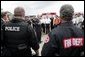 President George W. Bush addresses police and firemen after a demonstration by first responders at Northeastern Illinois Public Training Academy in Glenview, Illinois on Thursday July 22, 2004. White House photo by Paul Morse.