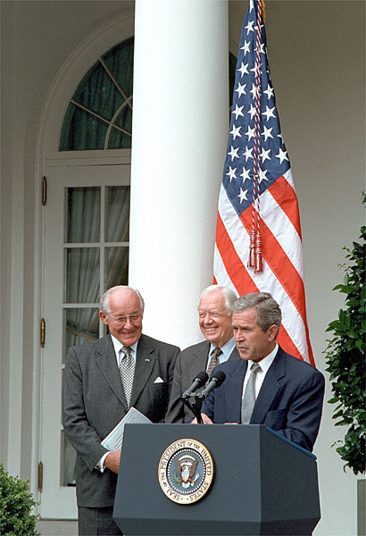 President Bush, former President Jimmy Carter and House Minority Leader Bob Michel hold a press conference addressing election reform principles in the Rose Garden July 31, 2001. White House photo by Eric Draper.