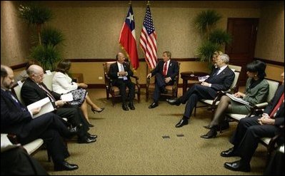 President Ricardo Lagos of Chile and President George W. Bush meet during the Special Summit of the Americas in Monterrey, Mexico, Jan. 12, 2004. White House photo by Eric Draper