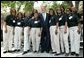 President George W. Bush poses for a photograph with the 16th Street Baptist Church Choir of Birmingham, Ala., at the Brown V. Board of Education National Historic Site in Topeka, Kan., Monday, May 17, 2004. White House photo by Eric Draper.