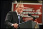 President George W. Bush addresses his remarks on the 2007 Budget and the Deficit Reduction Act of 2005, in a speech to the Business and Industry Association of New Hampshire, Wednesday, Feb. 8, 2006 in Manchester, N.H. White House photo by Paul Morse