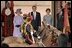 The Household Cavalry of Buckingham Palace parade by, from left, Her Majesty Queen Elizabeth, President George W. Bush, Laura Bush and Prince Philip, Duke of Edinburgh, during the ceremonial welcome at Buckingham Palace in London, Wednesday, Nov. 19, 2003. White House photo by Paul Morse