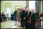 President George W. Bush and Laura Bush pose for a photo with actor Hal Holbrook, center, one of the National Humanities Medal Award recipients, during a ceremony in the Oval Office Friday, Nov. 14, 2003.  White House photo by Susan Sterner