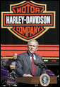 President George W. Bush talks with workers during a tour of the Harley-Davidson Vehicle Operations facility Wednesday, Aug. 16, 2006 in York, Pa., where he participated in a roundtable discussion on the economy. White House photo by Kimberlee Hewitt