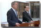 President George W. Bush and Chinese President Jiang Zemin deliver a joint statement to the media in Shanghai, People's Republic of China, Oct. 19. White House photo by Eric Draper.