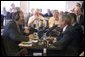 President George W. Bush and Sen. Chuck Grassley, R-Iowa, participate in an interview with radio talk show host Jan Mickelson at the Spring House Family Restaurant in Cedar Rapids, Iowa, March 30, 2005. White House photo by Paul Morse