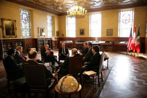 Joined by their advisors, President George W. Bush, Canadian Prime Minister Paul Martin and Mexican President Vicente Fox meet at Baylor University in Waco, Texas, during a March 23, 2005. White House photo by Eric Draper White House photo by Eric Draper