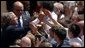 President George W. Bush greets the audience following his speech in the courtyard of the Wawel Royal Palace in Krakow, Poland, Saturday, May 31, 2003. White House photo by Paul Morse