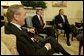 During a meeting with Secretary of Defense Donald Rumsfeld, President George W. Bush announces L. Paul Bremer, center, as the presidential envoy to Iraq in the Oval Office Tuesday, May 6, 2003. "He's a man of enormous experience; a person who knows how to get things done; he's a can-do type person," said the President of the former ambassador. White House photo by Paul Morse