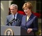 President George W. Bush and First Lady Mrs. Laura Bush at the 2004 Teacher of the Year award program in the Rose Garden of the White House on April 21, 2004. White House photo by Paul Morse