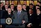 President George W. Bush speaks during the presentation of the Commander-In-Chief Trophy to the U.S. Naval Academy football team in the East Room Monday, April 19, 2004. The trophy is awarded to the Service Academy with the year's best overall record in NCAA football games versus the other academies. White House photo by Tina Hager.