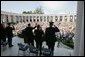 President George W. Bush, Secretary of Defense Donald Rumsfeld and Chairman of the Joint Chiefs of Staff General Richard Meyers participate in a Memorial Day ceremony at the Arlington National Cemetery amphitheatre in Arlington, Va., May 30, 2005. White House photo by Paul Morse