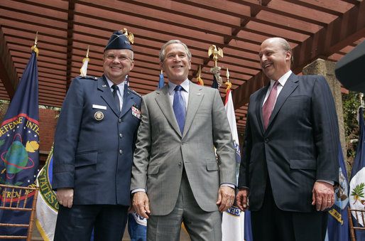 President George W. Bush stands with Ambassador John Negroponte and Lt. Gen. Michael Hayden after they were sworn in as the Director and Deputy Directory of National Intelligence at the New Executive Office Building Wednesday, May 18, 2005. White House photo by Paul Morse