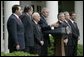 Discussing the Central American and Dominican Republic Free Trade Agreement, President George W. Bush stands with leaders from Central America and the Dominican Republic in the Rose Garden Thursday, May 12, 2005. From left, they are: El Salvadoran President Antonio Saca, Costa Rican President Abel Pacheco, Nicaraguan President Enrique Bolanos, Honduran President Ricardo Maduro, Guatemalan President Oscar Berger and Dominican Republican President Leonel Fernandez.  White House photo by Eric Draper