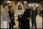 Father Michele Piccirillo, head of the Franciscan Archeology Society leads a tour for: from left, Laura Bush; Anita McBride, Mrs. Bush's Chief of Staff; Luma Kawar, the wife off the Jordanian Ambassador to the U.S.; and David Hale, the U.S. Charge in Jordan, in the Basilica on top of Mount Nebo in Jordan Saturday, May 21, 2005. White House photo by Krisanne Johnson