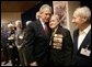 During a meeting with U.S. and Russian veterans, President George W. Bush hugs Russian veteran Vasik Ivanovich Korneer after he offered the President a coin from his service in Berlin during World War II in Moscow, Monday, May 9, 2005. President Bush asked that the veteran give the coin to a family member and thanked him for his courage. White House photo by Eric Draper