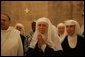 Benedictine nuns of the Church of the Resurrection at Abu Ghosh sing Psalm 150 in Hebrew during Laura Bush’s tour of monastery in Abu Ghosh Israel, Monday, May 23, 2005. White House photo by Krisanne Johnson