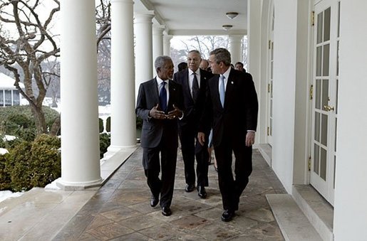 President George W. Bush and United Nations Secretary General Kofi Annan walk with Secretary of State Colin Powell along the colonnade in the Rose Garden at the White House Tuesday, Feb. 3, 2004. White House photo by Paul Morse