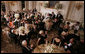 President George W. Bush and guests toasts Her Majesty Queen Elizabeth II of Great Britain following welcoming remarks Monday, May 7, 2007, during the State Dinner in her honor at the White House. White House photo by Eric Draper