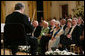 Violinist Itzhak Perlman plays during the entertainment portion of the White House State Dinner in honor on Her Majesty Queen Elizabeth II, Monday evening, May 7, 2007, in the East Room at the White House. White House photo by Eric Draper