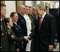 President George W. Bush greets military personnel on his visit to the Pentagon Thursday, May 10, 2007 in Arlington, Va., for a meeting with U.S. Defense Secretary Robert Gates and members of the Joint Chiefs of Staff. White House photo by Eric Draper