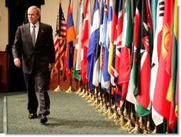 President George W. Bush walks on stage Tuesday, May 1, 2007, at Davis Conference Center at Tampa's MacDill Air Force Base, to deliver remarks to the CENTCOM Coalition Conference. White House photo by Eric Draper