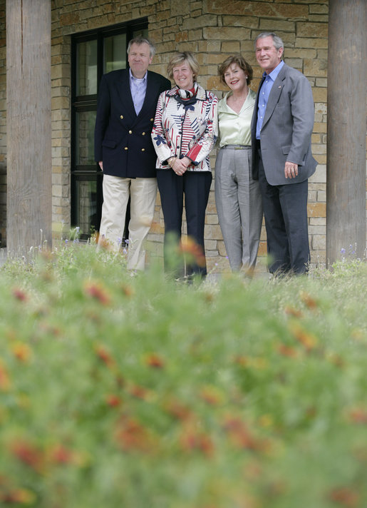 President George W. Bush and Laura Bush stand with NATO Secretary-General Jaap de Hoop Scheffer and his wife Jeannine de Hoop Scheffer Monday, May 21, 2007, at the Bush Ranch in Crawford, Texas. "The Secretary General of NATO has been a strong advocate of fighting terror, spreading freedom, helping the oppressed and modernizing this important alliance," said the President in his remarks to the press. White House photo by Eric Draper