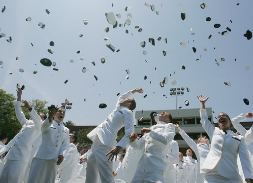 Following President George W. Bush’s address to U.S. Coast Guard Academy graduates Wednesday, May 23, 2007, in New London, Conn., cadets toss their hats into the air. White House photo by Joyce Boghosian