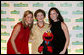 Mrs. Laura Bush is joined by her daughters Jenna Bush, left, and Barbara Bush, as they pose for a photo with Sesame Street character Elmo Wednesday evening, May 30, 2007, at the Sesame Workshop Fifth Annual Benefit Dinner in New York, where Mrs. Bush was honored for her commitment to literacy and education. White House photo by Shealah Craighead