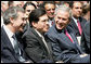 President George W. Bush is joined by U.S. Attorney General Alberto Gonzalez, center, and U.S. Secretary of Commerce Carlos Gutierrez in the Rose Garden at the White House Friday, May 4, 2007, during a celebration of Cinco de Mayo and to recognize the contributions of Mexican Americans. White House photo by Eric Draper