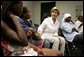 Laura Bush visits with people affected by Hurricane Katrina in the Cajundome at the University of Louisiana in Lafayette, La., Friday, Sept. 2, 2005. White House photo by Krisanne Johnson