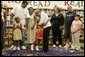 Laura Bush embraces a child Thursday, Sept. 8, 2005 of one of the families from New Orleans, displaced last week as a result of Hurricane Katrina, during a meeting at the Greenbrook Elementary School in DeSoto County, Miss. Greenbrook Elementary School has enrolled the most displaced students among the DeSoto County schools in Mississippi. White House photo by Krisanne Johnson