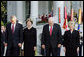 President Bush stands with Laura Bush, Vice President Dick Cheney and Mrs. Cheney as they observe a moment of silence, on the South Lawn, in honor of 9/11 victims September 11, 2005. This marks the fourth anniversary of terrorist attacks on both the World Trade Center and The Pentagon. White House photo by Krisanne Johnson