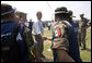 President George W. Bush greets aid workers from Mexico helping in the hurricane ravaged areas in Gulfport, Miss., Monday, Sept. 12, 2005. White House photo by Paul Morse