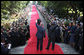  President George W. Bush and President Jakaya Kikwete of Tanzania, wave to the ceremonial arrival cordon as they reach the steps of the State House in Dar es Salaam Sunday, Feb. 17, 2008. White House photo by Eric Draper