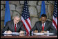 President George W. Bush and Rwanda President Paul Kagame sign a Bilateral Investment Treaty Tuesday, Feb. 19, 2008, at the Presidency in Kigali, Rwanda. White House photo by Chris Greenberg