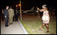 President George W. Bush and President John Agyekum Kufuor of Ghana watch a ceremonial dancer Tuesday, Feb. 19, 2008, upon the arrival of President Bush and Mrs. Laura Bush to Kotoka International Airport in Accra, Ghana. White House photo by Eric Draper