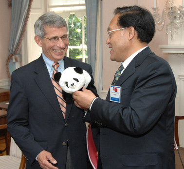 Wang presented Fauci with a toy giant panda